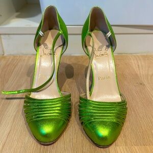 Christian Louboutin metallic lime leather heels.